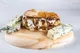 Panino de mandonguilles de vedella amb salsa cremosa de Gorgonzola DOP i ceba caramel·litzada a Balordi Barcelona — thumbnail 2