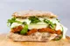 Panino de milanesa de pollastre cruixent amb crema de patata, rúcula i maionesa de wasabi a Balordi Barcelona — thumbnail